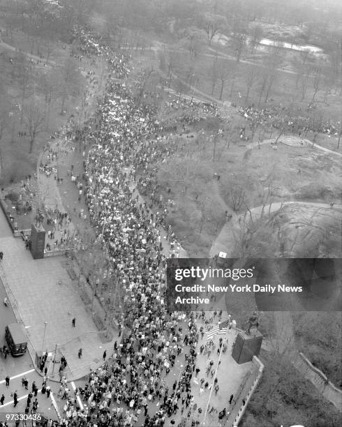 Vietnam Protest Parade on Central Park South and 6th Ave. Looking West.