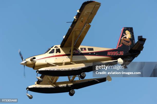 Turbo Beaver floatplane and special-livery tail-fin artwork on final-approach.