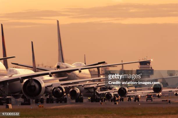 An Air France Boeing 777-300, a Delta Air Lines 767-300, a Continental Airlines 757-200, the Rolls-Royce 747-200 Trent 1000 engine test bed, an...