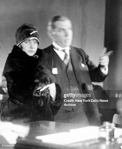 Vivian Madden and her attorney, Maurice McCarthy, go through proceedings at Washington Heights Court.