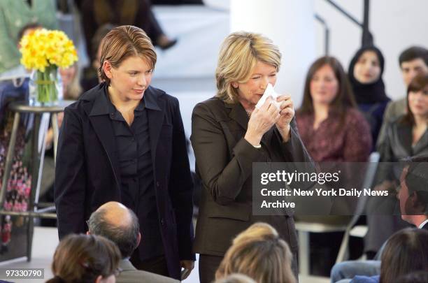 With her daughter, Alexis, by her side, Martha Stewart wipes away a tear as she speaks to her employees at Martha Stewart Living Omnimedia Inc. In...