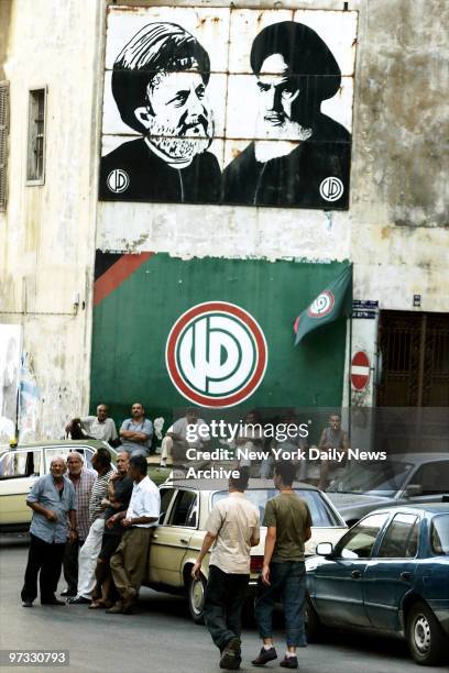 Taxi drivers wait for customers in central Beirut, which unlike the devastated southern areas of the city, has avoided air strikes by Israel.