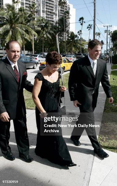 Mike Piazza's parents, Vince and Veronica, and his brother, Tommy, arrive at St. Jude's Catholic Church in Miami to attend the wedding of the New...