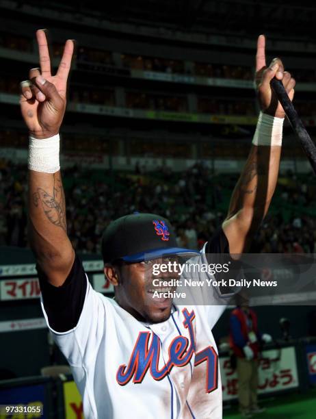 New York Mets' Jose Reyes celebrates after his walkoff home run in the bottom of the 10th inning won Game 5 of the 2006 Japan All Star Series for the...