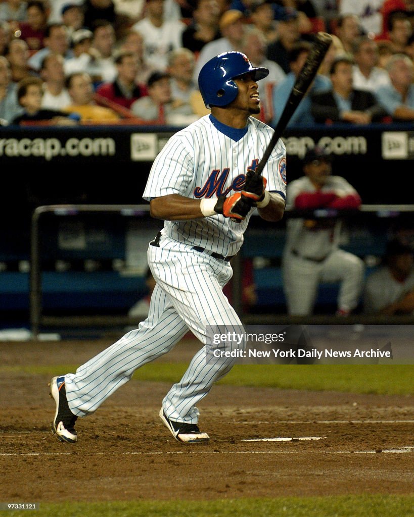 New York Mets' Jose Reyes hits a lead-off homer in the first