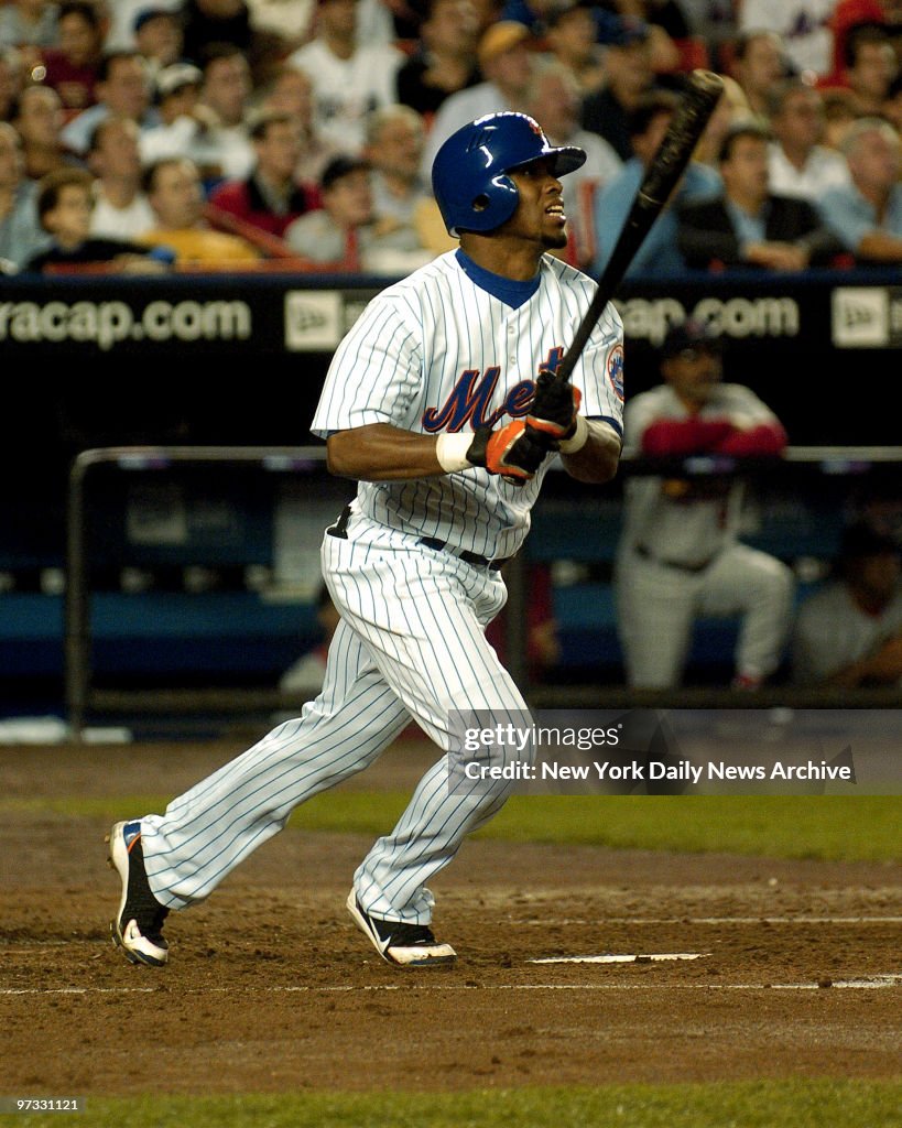 New York Mets' Jose Reyes hits a lead-off homer in the first