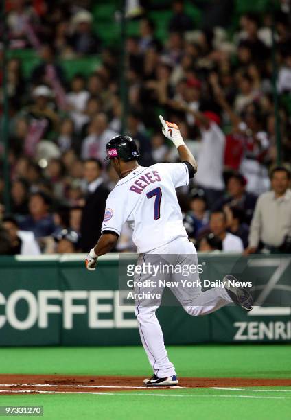 New York Mets' Jose Reyes rounds the bases after hitting a walkoff home run in the bottom of the 10th inning to win Game 5 of the 2006 All-Star...