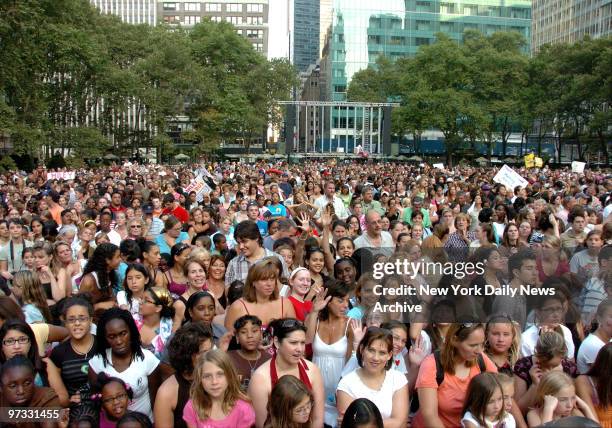Miley Cyrus performing in a packed Bryant Park on the Good Morning America Show ..some of the kids camped out overnight with their parents to get...