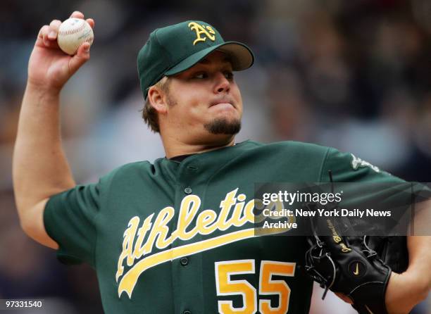 Oakland Athletics' starter Joe Blanton pitches against the New York Yankees in the first inning of game at Yankee Stadium. He allowed four hits and...