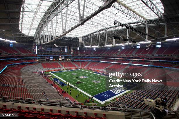 View of a mostly empty University of Phoenix Stadium before the start of Super Bowl XLII between the New York Giants and New England Patriots.