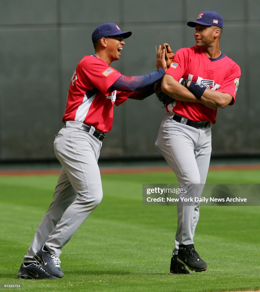 Team USA's Alex Rodriguez (left) clowns around with teammate