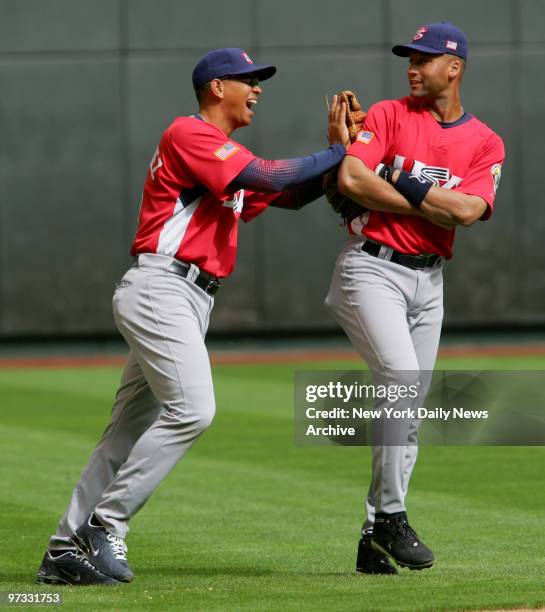 Team USA's Alex Rodriguez clowns around with teammate Derek Jeter during a practice at Chase Field in Phoenix, Ariz. Team USA is preparing to play in...