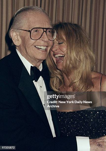 Milton Berle gets a big laugh from Goldie Hawn at the G & P Charitable Foundation for Cancer Research benefit at the Sheraton Hotel.