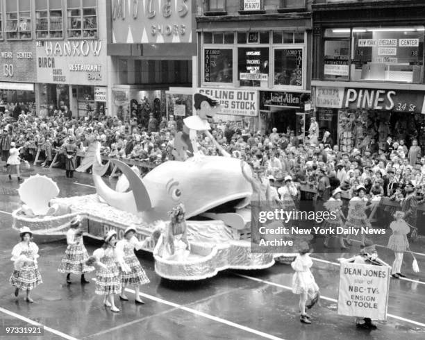 Televisions Dean Jones, decked out as "Ensign O'Toole," rides on the Pinocchio float, and has a whale of a time as Macy's Thanksgiving Day parade...