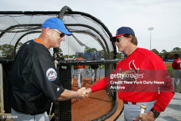 New York Mets' manager Art Howe greets St. Louis Cardinals' manager Tony LaRussa before an exhibition game at the Mets' spring training camp in Port...