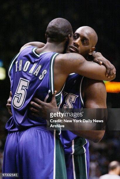 Milwaukee Bucks' Tim Thomas hugs teammate Anthony Mason after defeating the New Jersey Nets, 88-85, in Game 2 of the Eastern Conference Quarterfinals...