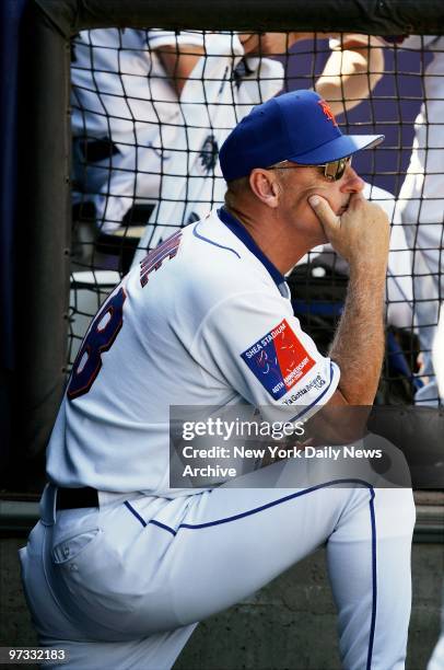 New York Mets' manager Art Howe watches from the dugout as his team succumbs to the San Diego Padres at Shea Stadium. The Padres went on to win, 10-3.