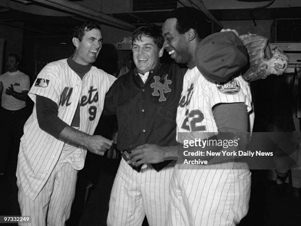 Teammates J.C. Martin and Don Clendenon congratulate New York Mets' pitcher Tom Seaver after a winning performance in the fourth game of the World...