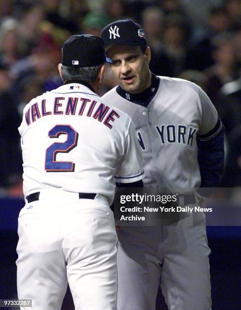 New York Mets' manager Bobby Valentine and New York Yankees' manager Joe Torre shake hands before start of Game 3 of the World Series at Shea Stadium.