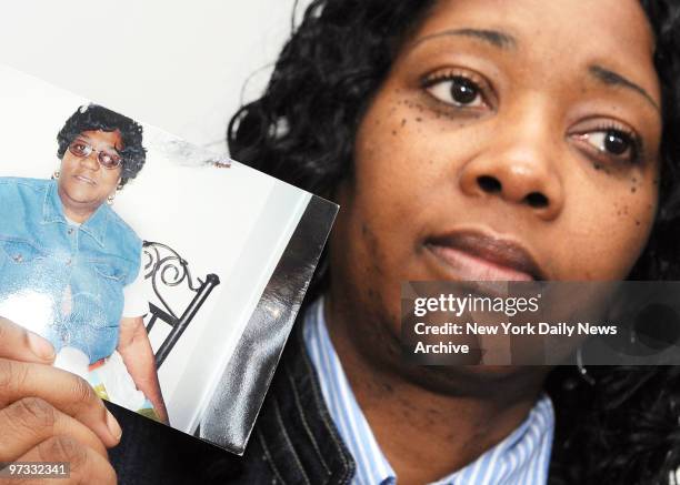 Patricia Henry holds photo of mom, Verda Henry, who died at Sutton Park Center for Nursing and Rehabilitation in New Rochelle partially because of a...