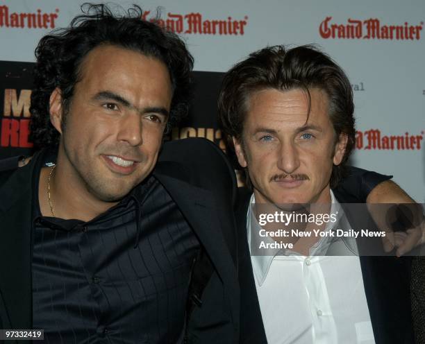 Director Alejandro Gonz?lez I??rritu gets together with Sean Penn at Avery Fisher Hall for the closing of the 41st New York Film Festival, featuring...
