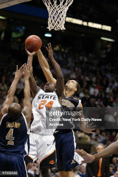 Oklahoma State Cowboys' Tony Allen goes up for a basket in second half of NCAA Regional Playoff game against the Pittsburgh Panthers at Continental...