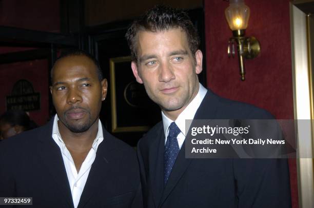 Director Antoine Fuqua and star Clive Owen are at the Ziegfeld Theater for the world premiere of their movie "King Arthur."