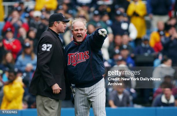 Minnesota Twins' manager Ron Gardenhire argues with home plate umpire Gary Darling over a strike-out call in the sixth inning of game against the New...