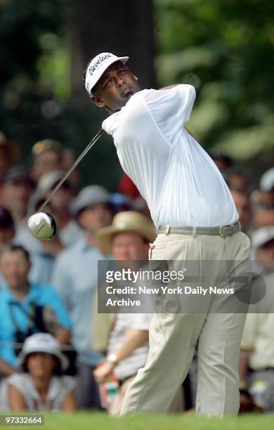 Vijay Singh of Fiji hits his tee shot on the first hole during third round play of the 87th PGA Championship at Baltusrol Golf Club in Springfield,...