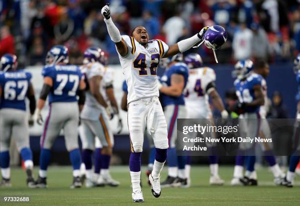 Minnesota Vikings' safety Darren Sharper celebrates at the end of game against the New York Giants at Giants Stadium. The Giants became the first...