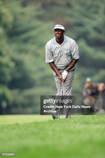 Vijay Singh watch his shot on the 15th hole during final round play at the 87th PGA Championship at Baltusrol Golf Club in Spingfield, N.J.