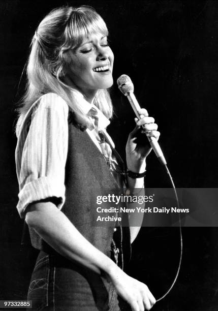 Olivia Newton-John sings during United Nations Children's Fund concert at United Nations General Assembly.