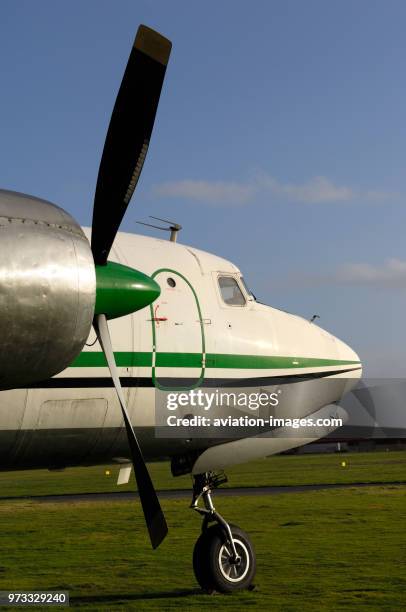 Propellers, engine cowling of PW R-2800-CB engine, mainwheel undercarriage and windshield of an Air Atlantique Douglas DC-6A.