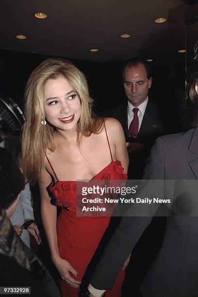 Mira Sorvino attending the premiere of "Mighty Aphrodite" at the Paris Theater. She's in the movie.