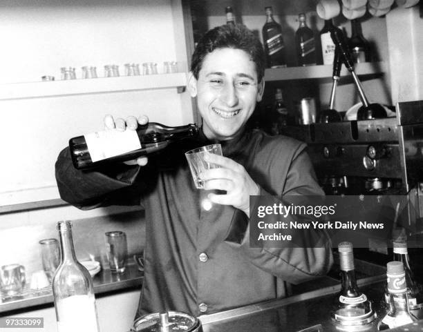 Vino for crew. Steward on board the Tall Ship Amerigo Vespucci pours not a ration of grog, but wine. Italian Navy also allows beer at sea. Ours, of...