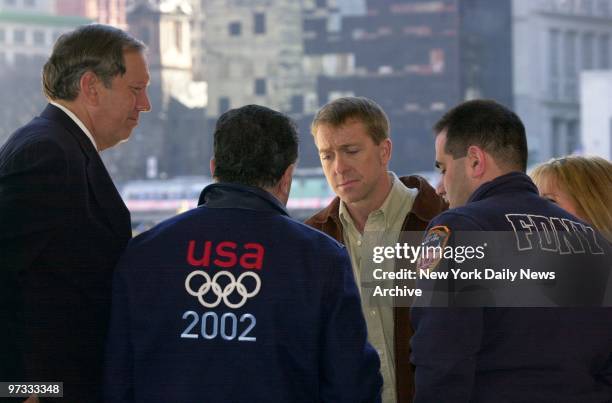 Olympic skeleton gold medal winner Jim Shea visits Ground Zero with Gov. George Pataki, Carlo Casoria Sr. And Firefighter Carlo Casoria Jr. During...