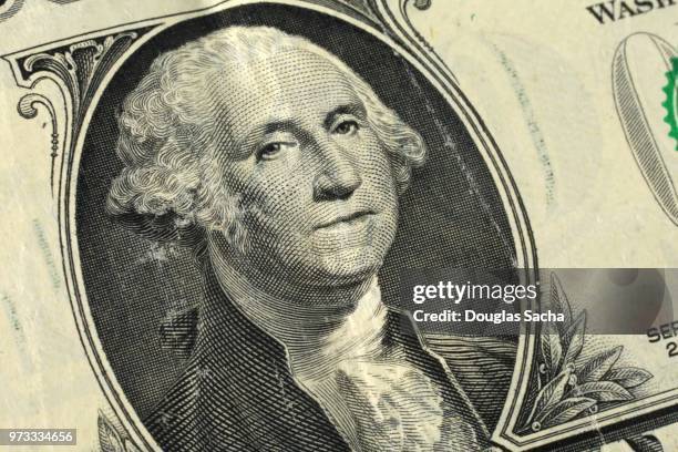 full frame of a one dollar bill in us currency - dollar sign stock-fotos und bilder