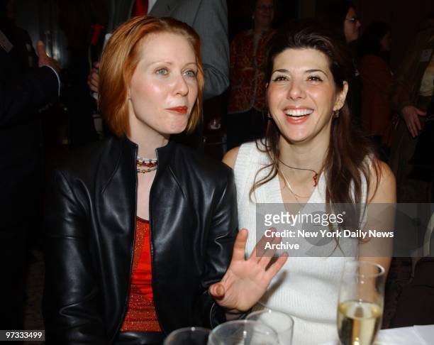 Emcee Cynthia Nixon and Marisa Tomei get together at the New York Women in Film & Television Gala Holiday Luncheon and presentation of the 2001 Muse...