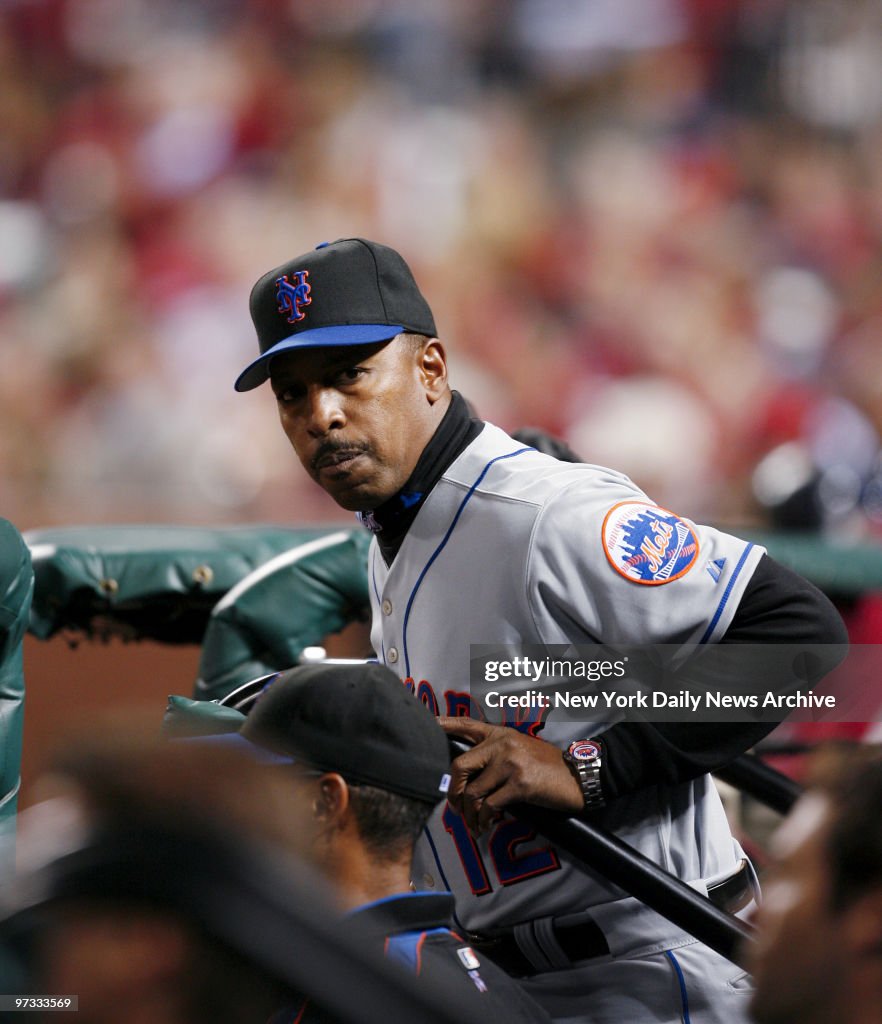 New York Mets' manager Willie Randolph stands on the steps o