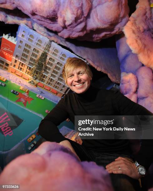 Director of Windows at Macy's Herald Square, Paul Olszewski, poses in the " Making of a Snowflake" window which is still under construction, to be...