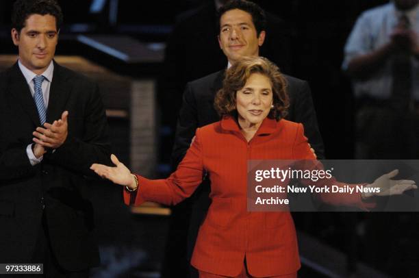 Teresa Heinz Kerry addresses the Democratic convention in Boston's FleetCenter. Her sons, Chris and Andre, look on.