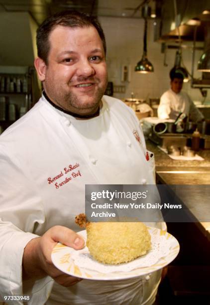 On the final day of the fabled Russian Tea Room, executive chef Renaud LaRasle displays the restaurant's last sserving of Chicken Kiev. The...