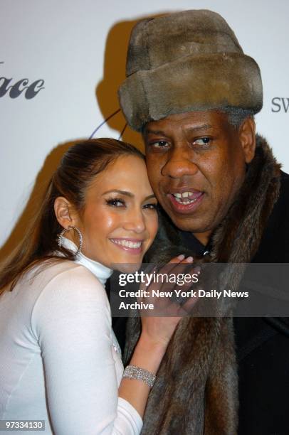 Vogue editor-at-large Andre Leon Talley congratulates Jennifer Lopez backstage after a showing of her fall 2005 collection in the Tent at Bryant Park...