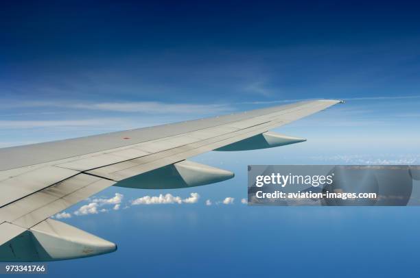 Trailing-edge of the wing and flaps of an American Airlines Boeing 757-200 enroute SJU-MIA on flight-number AA1236.