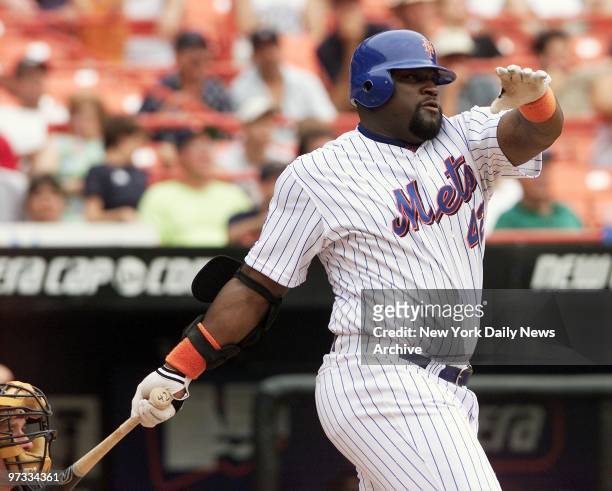 New York Mets' Mo Vaughn connects for a hit in the seventh inning against the Arizona Diamondbacks' at Shea Stadium. It was one of only two hits for...