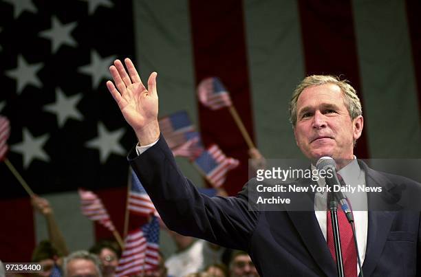 Texas Gov. George W. Bush campaigns at the Adler Theater in Davenport, Iowa, on the last day of his run for the presidency.
