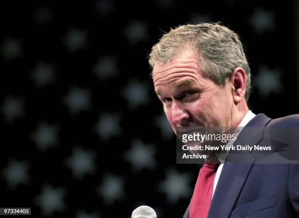 Texas Gov. George W. Bush campaigns at the Adler Theater in Davenport, Iowa, on the last day of his run for the presidency.