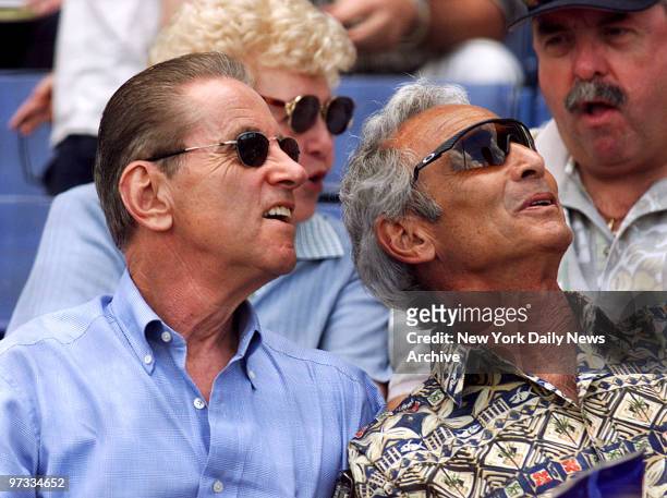 New York Mets owner Fred Wilpon and Hall of Famer Sandy Koufax watch the Mets vs. Los Angeles Dodgers spring training game from the stands.