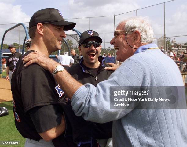 New York Mets' part owner Nelson Doubleday shares a laugh with Al Leiter and John Franco on practice field during spring training at Thomas J. White...