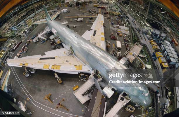 26th Boeing 747-400 for United Airlines, 2nd in from the hangar doors and winglet of Asiana 747-400 on the Everett production-line.